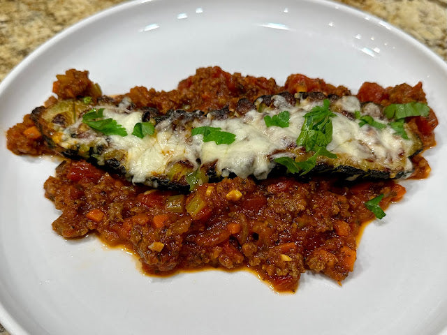 BAKED ZUCCHINI WITH MOZZARELLA AND MEAT SAUCE